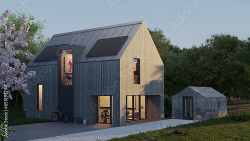 Holzhaus mit Solarmodulen in der Dämmerung