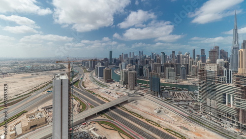 Panorama showing skyline of Dubai with business bay and downtown district. photo