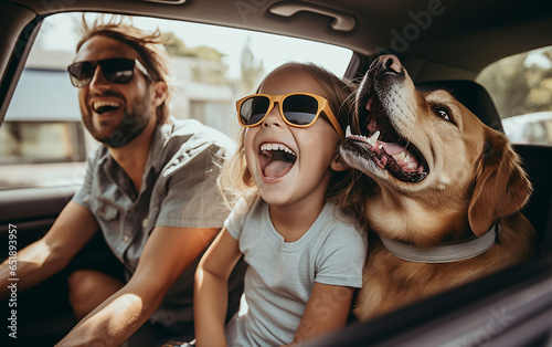 Father and daughter with pet dog driving together and having fun on vacation © perfectlab