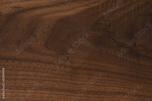 Black walnut wood texture with oil finish closeup