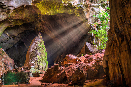 Light rays inside of the Sadan cave near Hpa-An in Myanmar photo