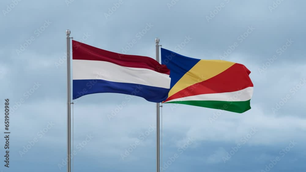 Seychelles and Netherlands flag waving together on cloudy sky, endless seamless loop, two country cooperation concept Seychelles and Netherlands flag waving together on cloudy sky, endless seamless loop, two country cooperation concept