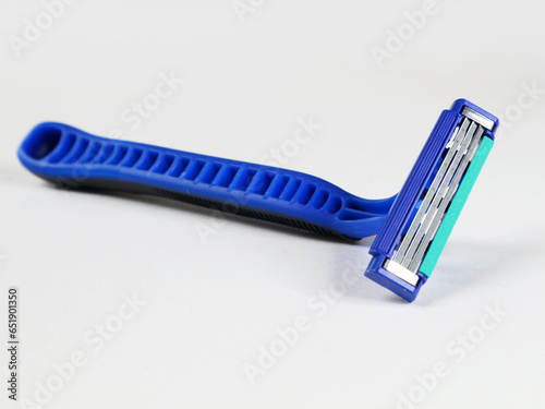Three-blade Beard Shaver tool on white background