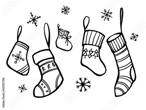 Collection of black and white Christmas stockings with ornament. Socks for gifts with snowflakes in doodle hand draw style.