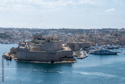 Valletta, Malta, May 1, 2023. Panoramic view of Fort St. Angelo from Upper Barrakka Gardens