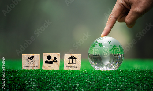 ESG concept of environmental, social and governance. Words ESG on crystal globe. It is an idea for sustainable organizational development. ​account the environment, society and corporate governance