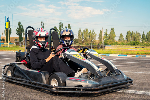 twin racing go kart for two girls driving