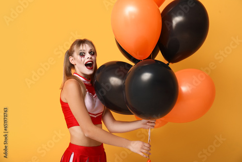 Young woman dressed for Hal...