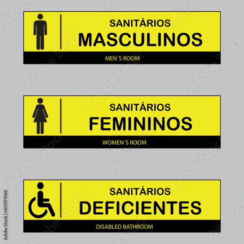 Placa Amarela e Preta para Banheiros Masculinos, Femininos e Deficientes. Arte intuitiva com tradução para o inglês.