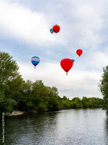 Balloons floating over the Boise River