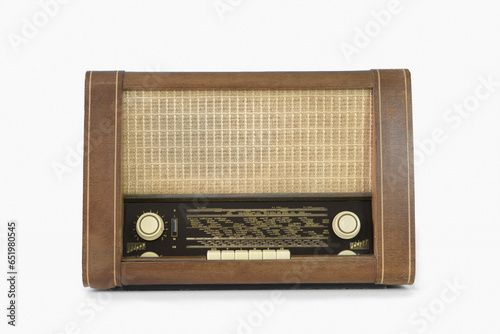 Authentic 60s radio receiver. Front view. On white background. Traces of time. isolated on white.