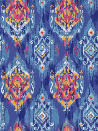 Ikat paisley embroidery on background.geometric ethnic oriental seamless pattern traditional.Aztec style abstract vector illustration.design for texture,fabric,clothing,wrapping,decoration,carpet