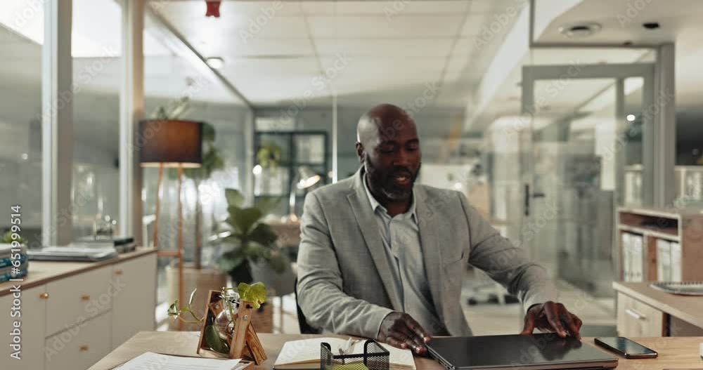 Man, phone and walking in office for work on laptop in business planning, finance or digital. Black person, entrepreneur or staff at desk to review file, report or contract at accounting job Man, phone and walking in office for work on laptop in business planning, finance or digital. Black person, entrepreneur or staff at desk to review file, report or contract at accounting job