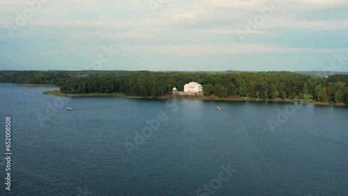 Aerial 4K footage of Uzutrakis Manor in Trakai Galve lake, Lithuania. Video during daylight in autumn photo