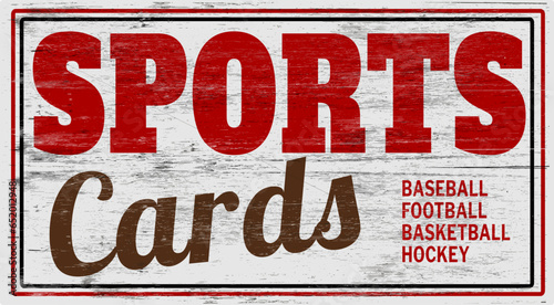 Aged and worn sports cards sign on wood