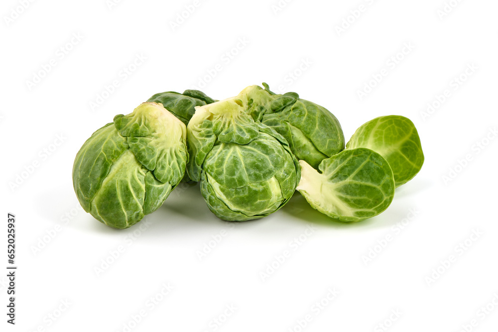 Fresh green Brussels sprouts, isolated on white background. High resolution image. Fresh green Brussels sprouts, isolated on white background. High resolution image.