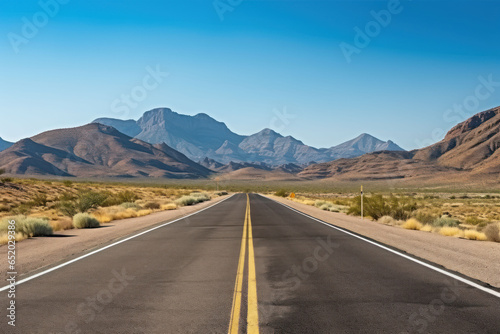 Long automobile road, highway along the mountains and desert, travel concept, traveling by car