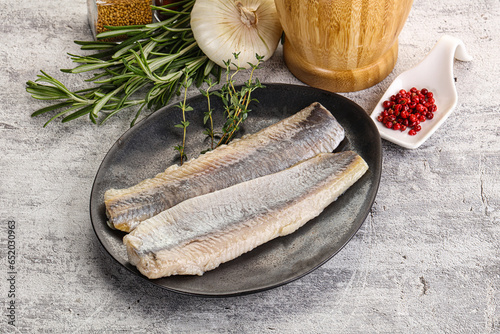 Fotografia Pickled atlantic tasty herring fillet