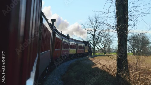Riding on an old steam train.