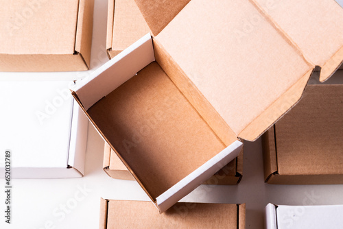Lot of cardboard box, brown and white, mockup, opened, empty inside © mdbildes