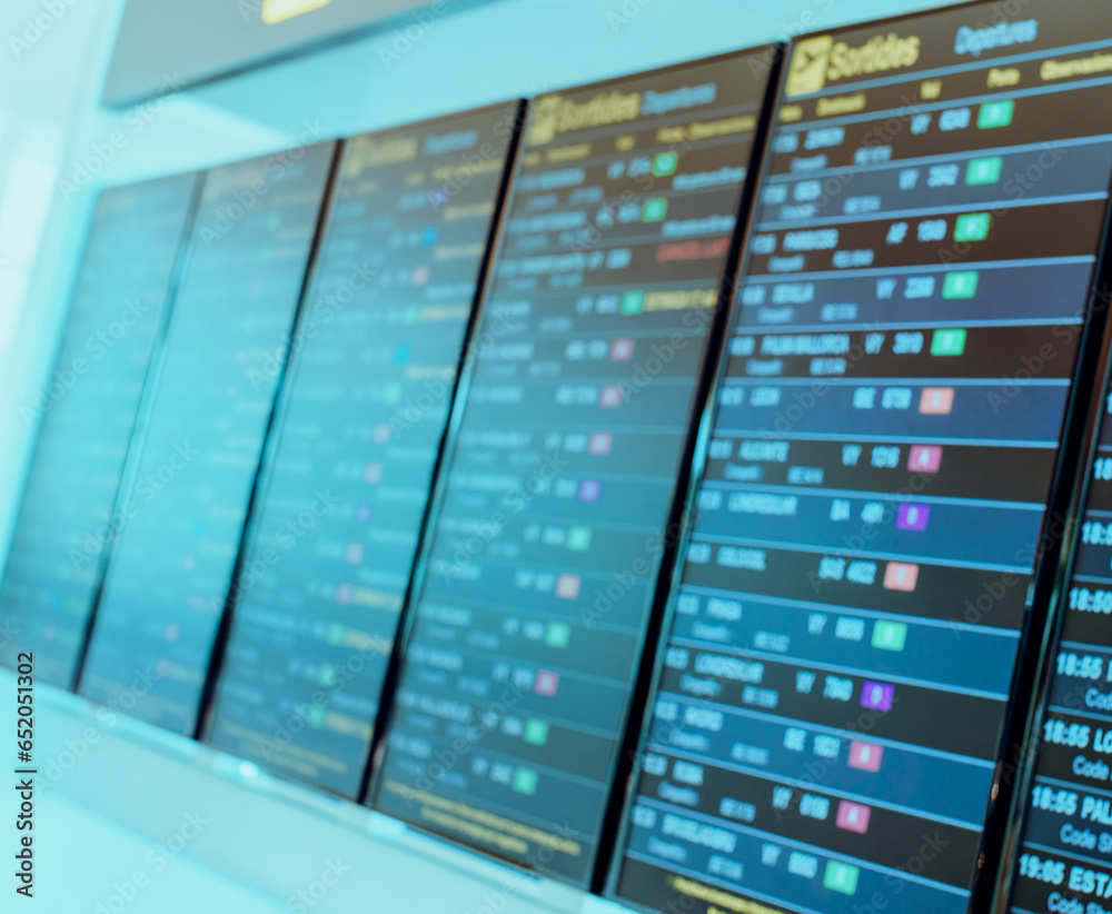 Departure boards at airport, abstract out of focus background Departure boards at airport, abstract out of focus background