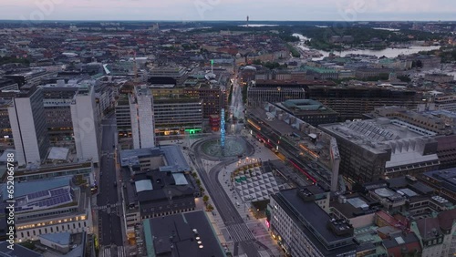 Aerial slide and pan footage of Sergels torg at twilight. Public square in modern urban borough. Stockholm, Sweden photo