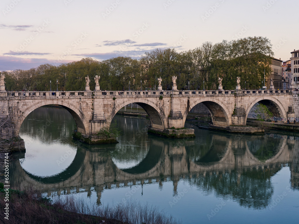 Sant'Angelo bridgereflecting in Tiber, Rome, Italy