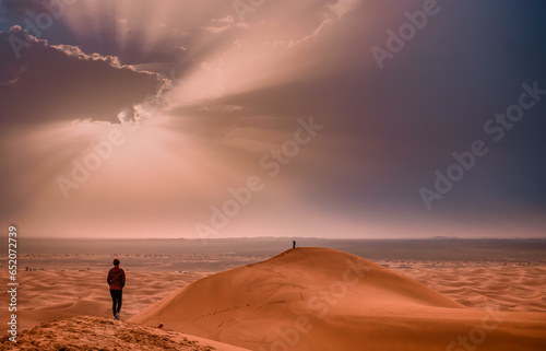 sunrise above the Sahara sand dunes