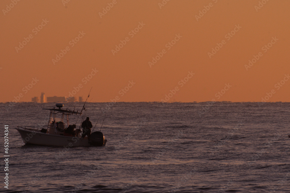 Avon By the Sea New Jersey USA - Fishing boats near the shore at sunrise 