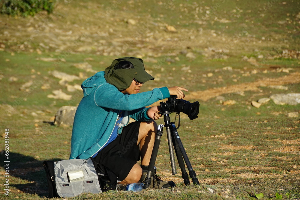 wildlife photographer on action