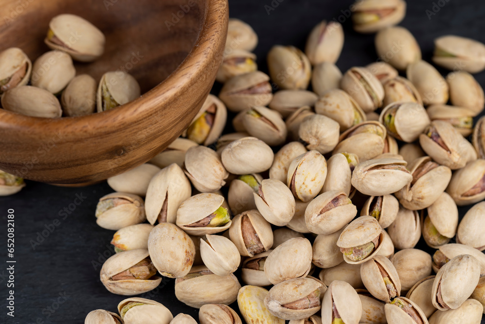 a large number of salty and crispy pistachios close-up a large number of salty and crispy pistachios close-up