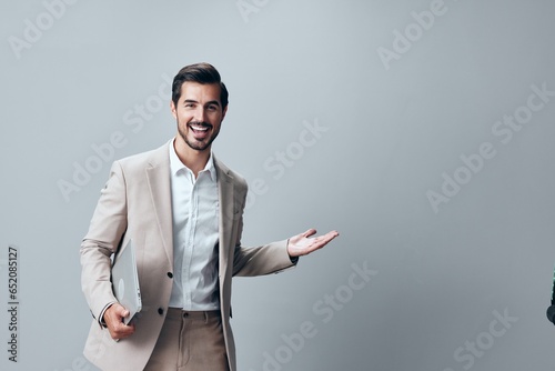 man suit copyspace internet business freelancer computer smiling job laptop young