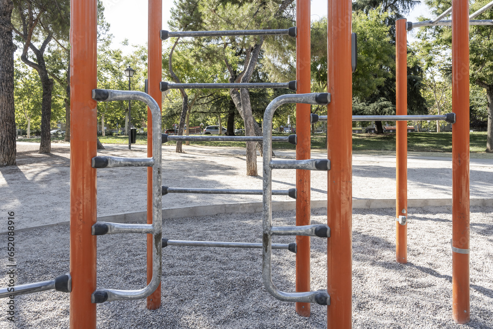 A few exercise poles and bars in an urban park