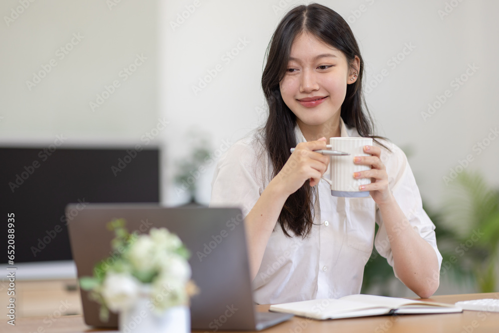 Serious young adult business asian woman or young asian student brainstorming at home work. Serious young adult business asian woman or young asian student brainstorming at home work.
