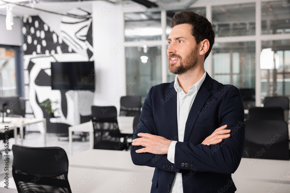 Happy real estate agent indoors. Space for text Happy real estate agent indoors. Space for text