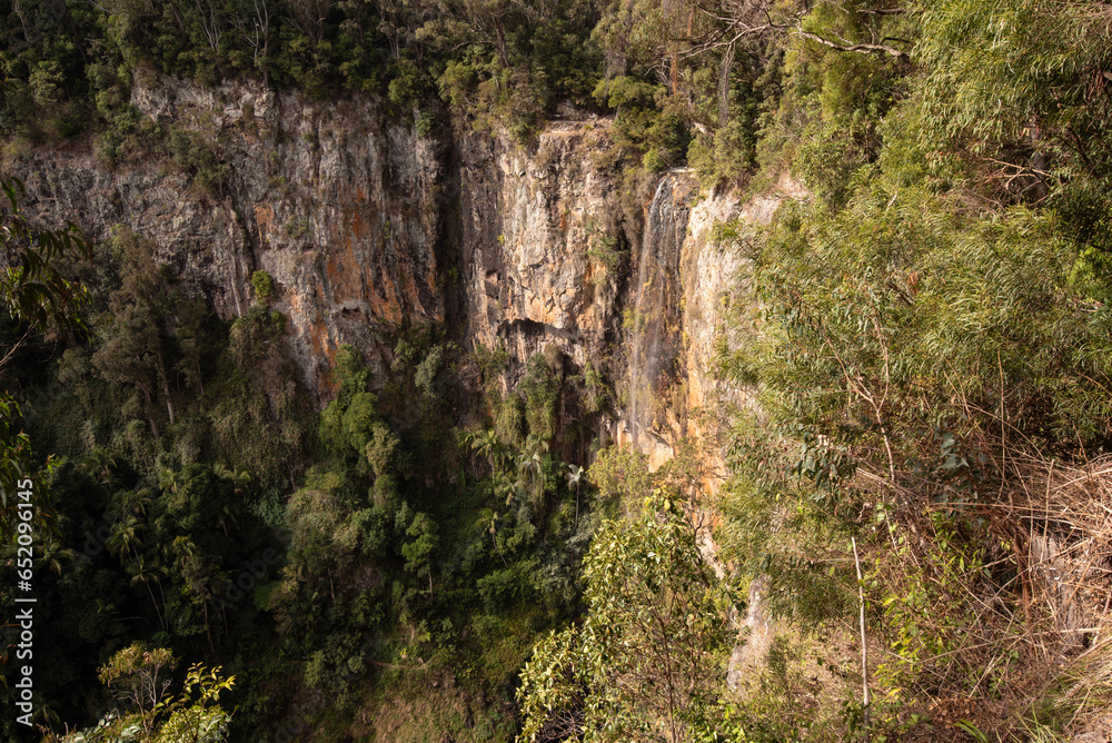 Purling Brook Falls in Springbrook National Park, Queensland, Australia. The falls are fairly dry due to recent dry weather. Purling Brook Falls in Springbrook National Park, Queensland, Australia. The falls are fairly dry due to recent dry weather.