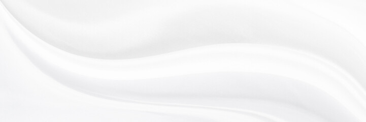 White gray satin texture that is white silver fabric silk panorama background with beautiful soft blur pattern natural.