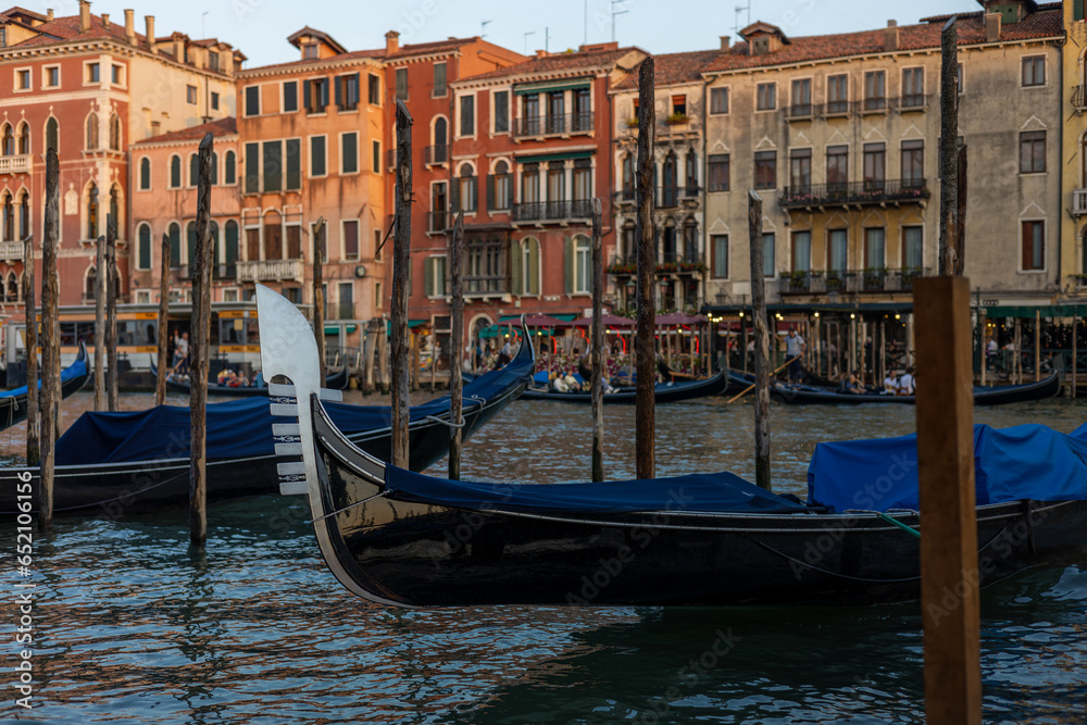 View of Grand Canal Venice at sunset, with gondola, Venice Italy, selective focus