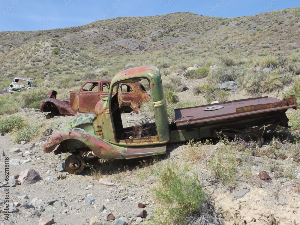 Several Rusty Abandoned Vehicles in Death Valley National Park