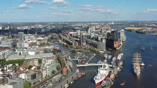 Drone flight, drone shot, video, Hafencity, Speicherstadt, Elbe, Steinwerder, Landungsbruecken, museum ship, Rickmer Rickmers, Elbe Philharmonic Hall in foreground, Cap San Diego, Hamburg, Germany photo