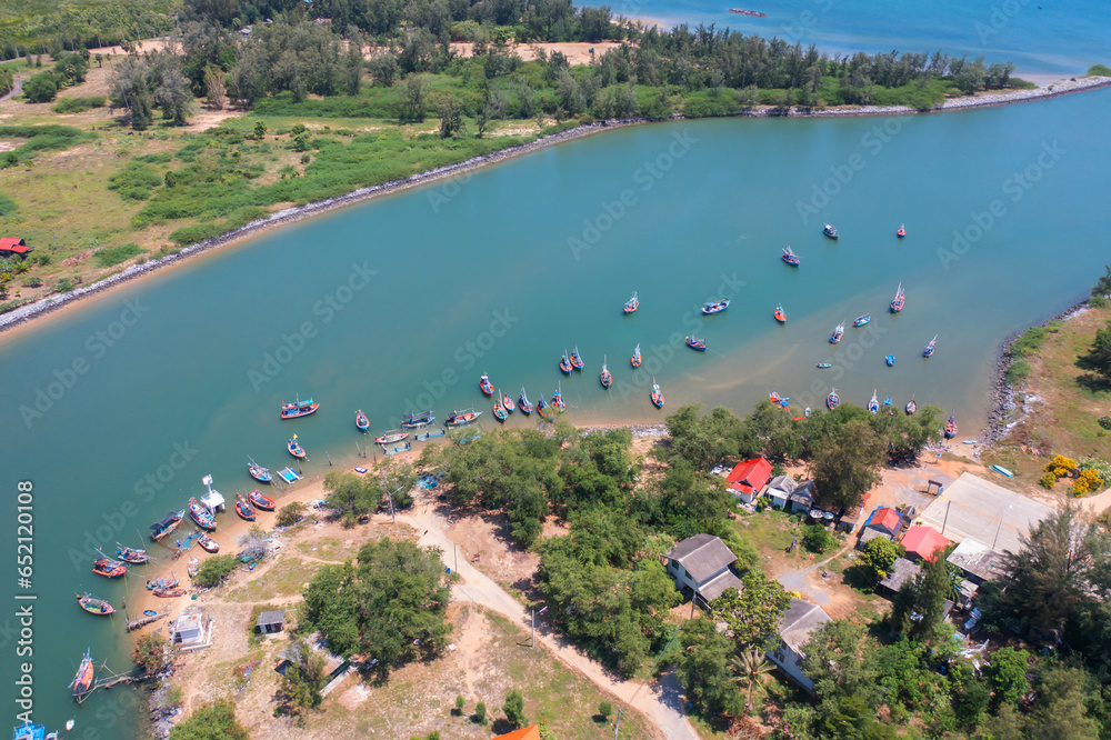 Aerial top view of tourist boats in beach shore, river, pond or lake in summer season. Nature landscape background, Thailand. Aerial top view of tourist boats in beach shore, river, pond or lake in summer season. Nature landscape background, Thailand.
