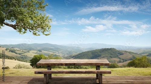 Countryside landscape with an aged, weathered wooden table.