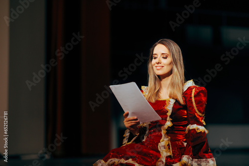 Fotografie Beautiful Actress Reading her Lines Sitting on Stage