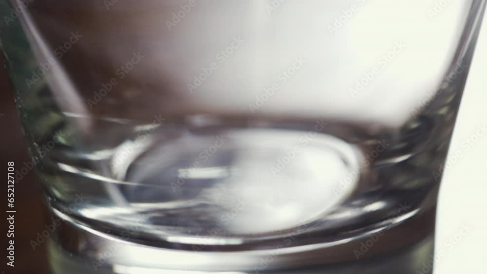 Slow Motion Close up Dropping Egg in Glass Slow Motion Close up Dropping Egg in Glass