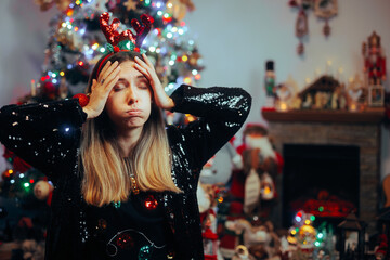 Woman Forgetting Something Important for Christmas Celebration. Lonely girl suffering from seasonal affective disorder 
