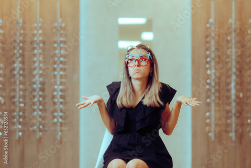 Funny Woman Having Many Options for New Glasses Frames. Stylish girl deciding which glasses suits her best 
