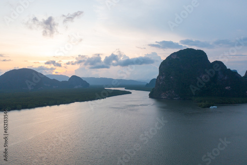 Aerial top view of a garden park with green mangrove forest trees  river  pond or lake. Nature landscape background  Thailand.