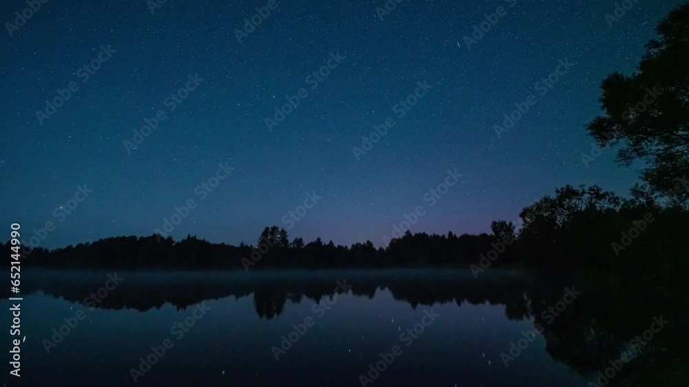 Night sky, reflected in the lake, Timelapse, movement of stars. Night sky, reflected in the lake, Timelapse, movement of stars.