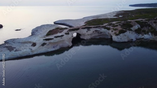 Wallpaper Mural Famous Sardinian arch coast rock formation, S'Archittu, aerial view, sunset Torontodigital.ca