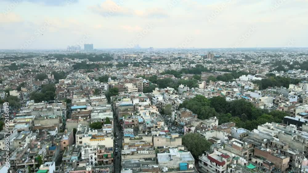 4K Aerial Shots of New Delhi Residential Suburbs on a beautiful day gliding over Rooftops, streets, parks and markets in India 4K Aerial Shots of New Delhi Residential Suburbs on a beautiful day gliding over Rooftops, streets, parks and markets in India